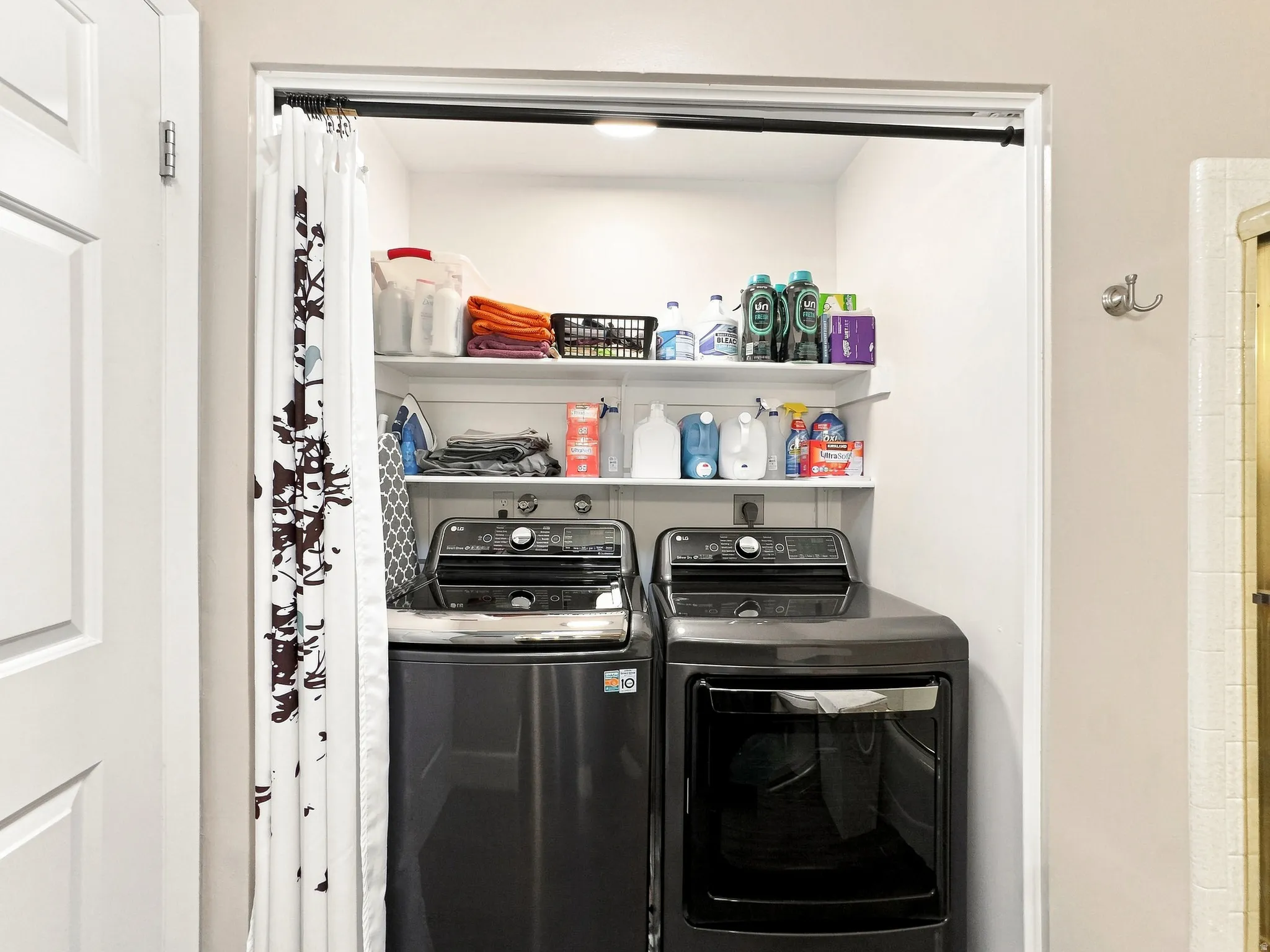 Laundry Area with Shelving  in Bathroom