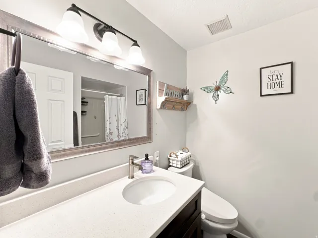 New Cabinets, Quarts, Mirror, New Lights, Toilet and Plumbing Fixtures, Added Electrical Outlet