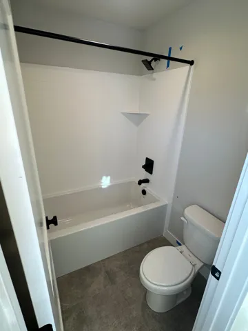 Main bathroom that separates toilet/tub and sinks.