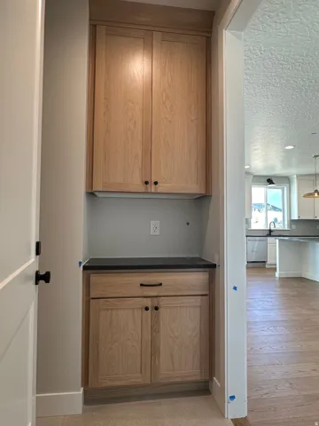 Drop all from garage for anything in your arms when you walk into the mudroom from garage.