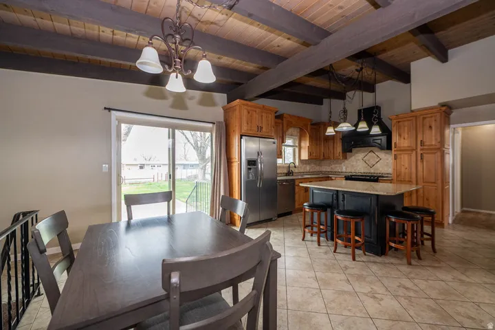 Vaulted wood-paneled ceiling with exposed beams