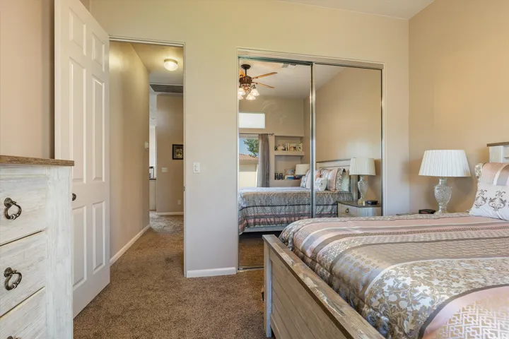 Wall-to-wall carpeting and neutral wall tones