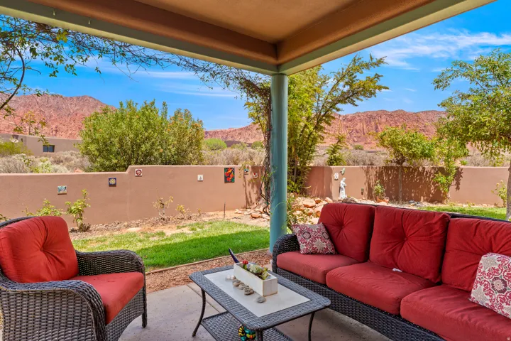 Covered patio featuring an outdoor ceiling, structural pillar, and concrete flooring