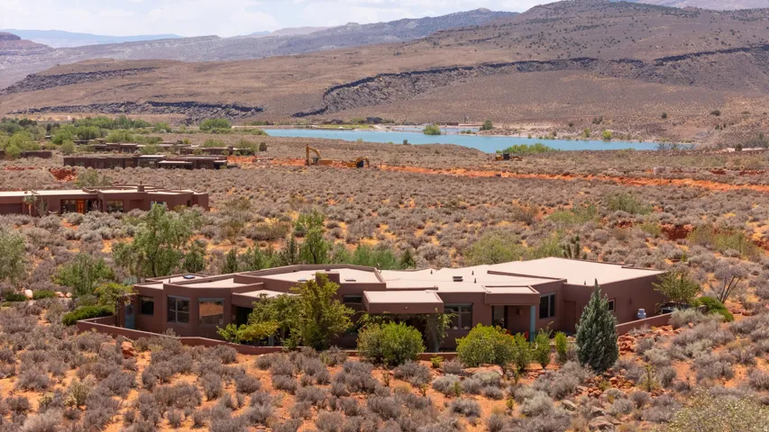 Contemporary architecture with flat rooflines, integrated landscaping, and a desert backdrop
