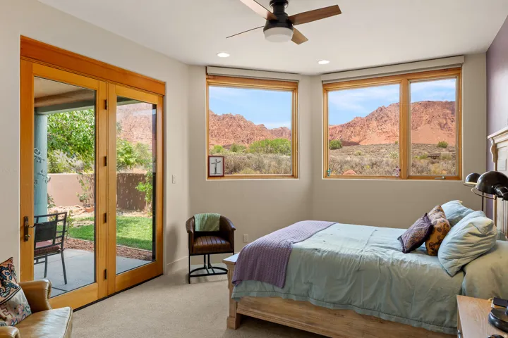 Recessed lighting, ceiling fan, wood-frame glass doors, wood-frame windows, and wall-to-wall carpeting