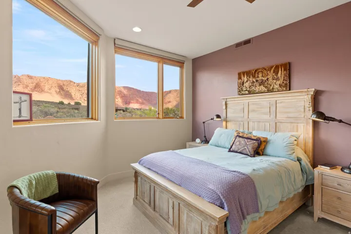 Expansive windows frame distant desert mountains