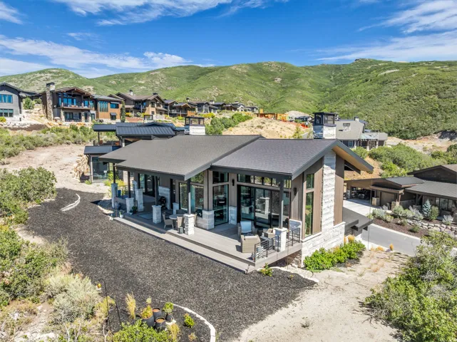 Contemporary architectural design featuring expansive decking and large windows