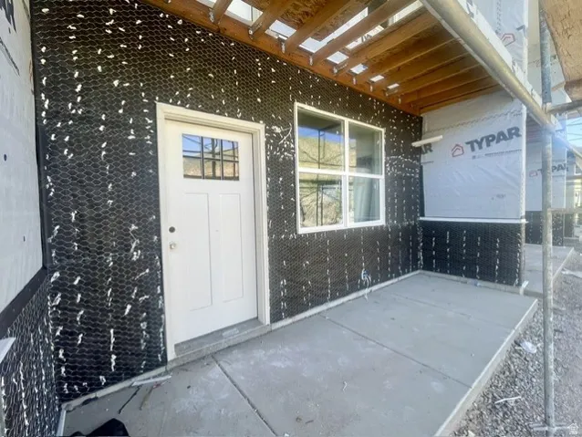 Covered front porch. Craftsman-style exterior to be finished in stone and cement board siding.