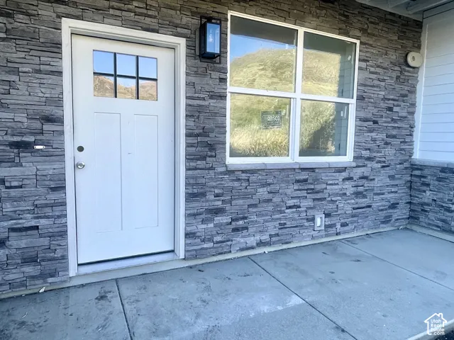 Covered front porch ~17-feet wide.