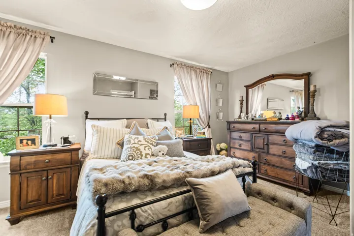 Wall-to-wall carpeting with light gray wall paint