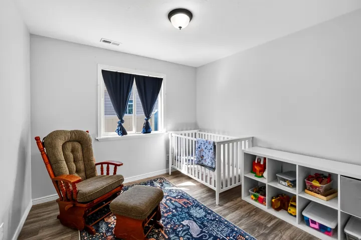 White walls with wood-finish flooring