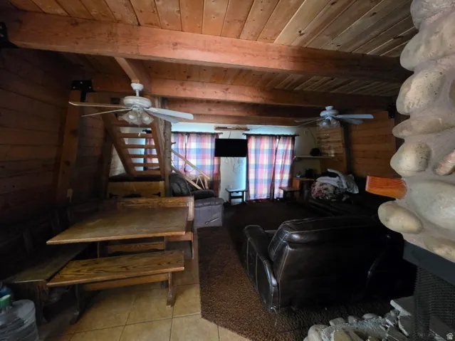 Wood-paneled ceilings with exposed wood beams
