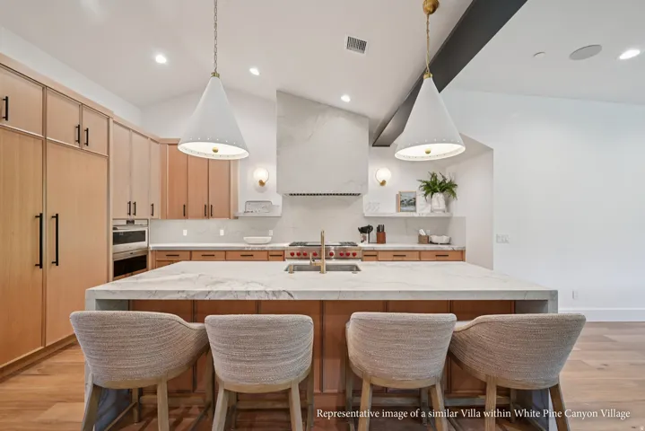 Central kitchen island with an undermount sink