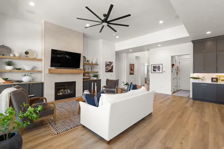 Open-concept living space with wood-finish flooring