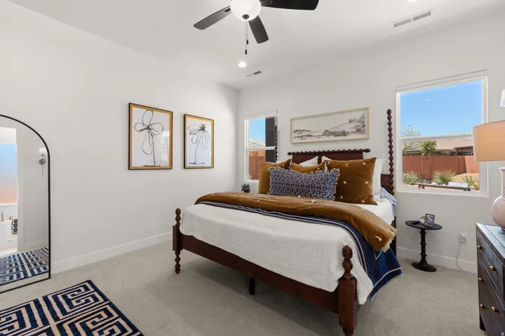 Recessed lighting, ceiling fan, and carpeted flooring