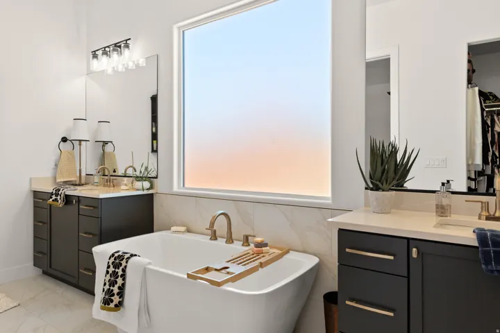 Freestanding soaking tub with a large picture window