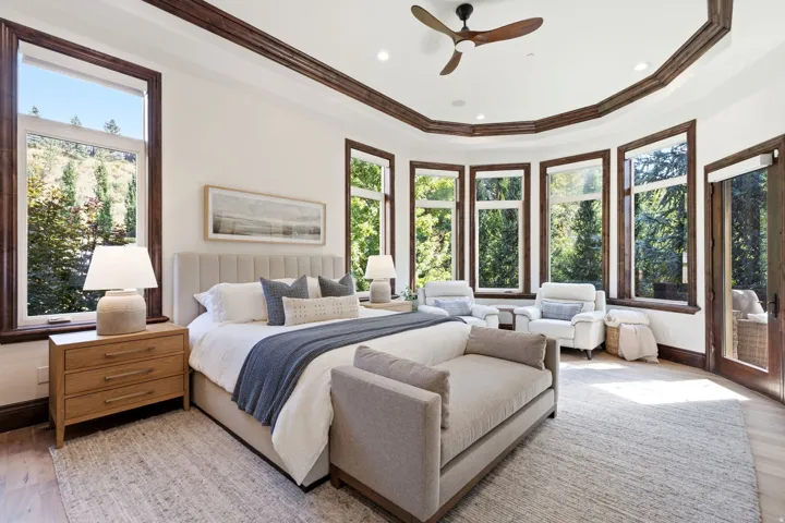Recessed lighting, wood-finish flooring, and a ceiling fan