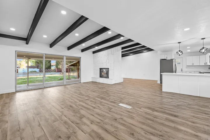 Spacious Family Room with 3 Sliding Doors to the Covered Back Patio