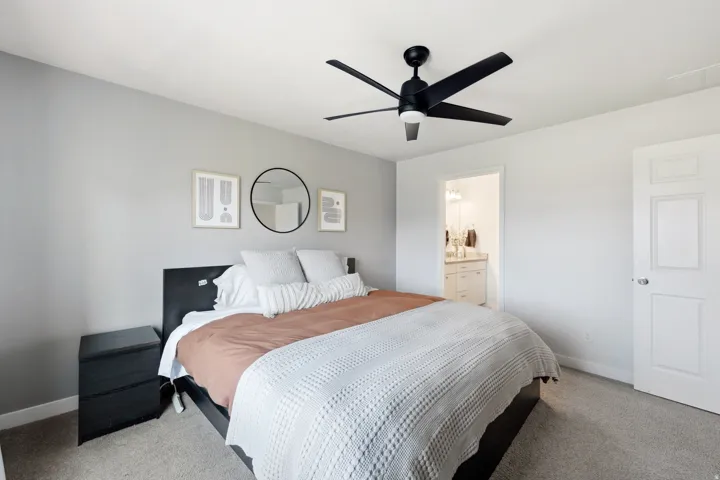 Recessed lighting, ceiling fan with light fixture, carpeted flooring, and a panel door