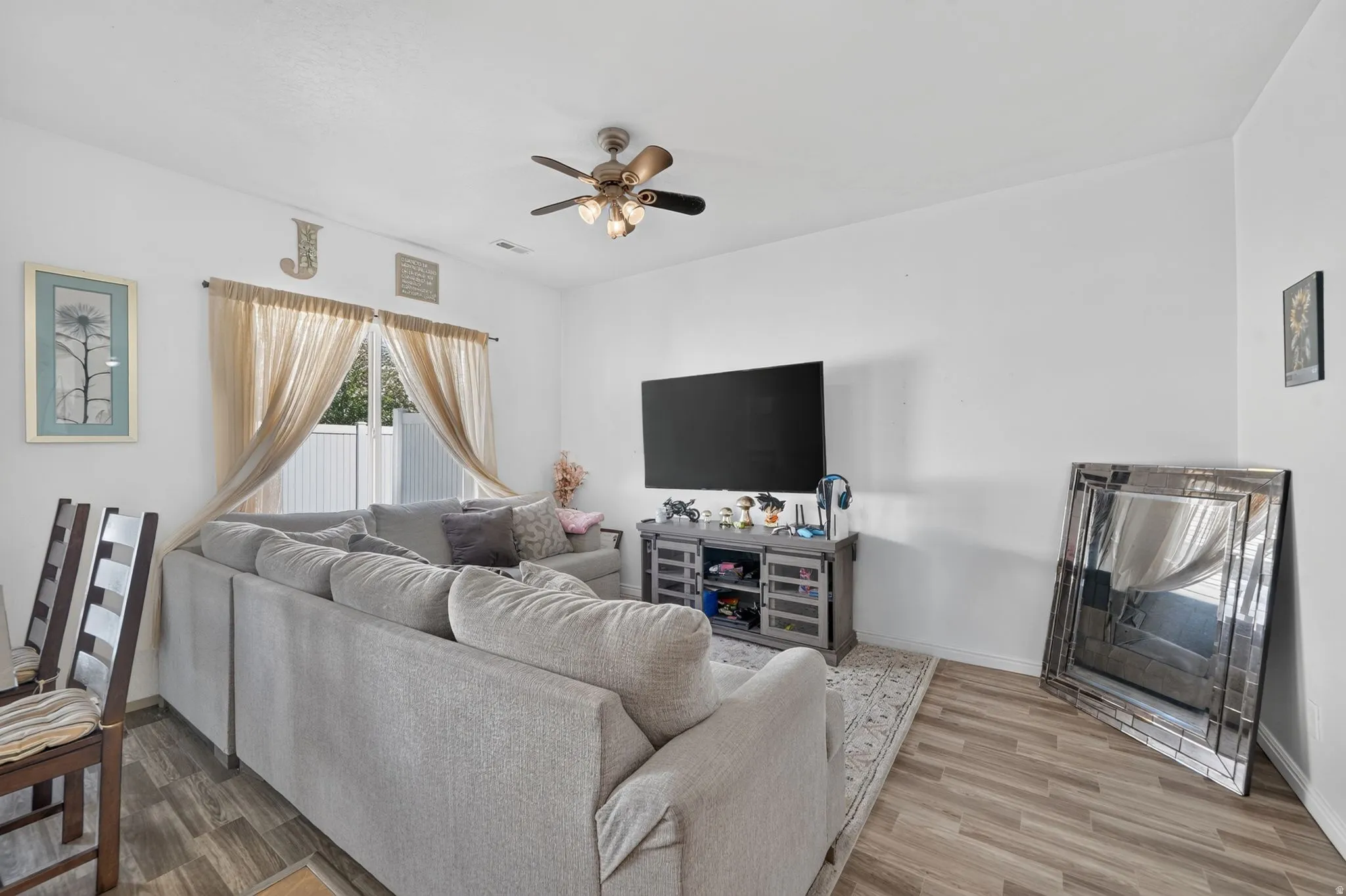 Wood-finish flooring with white walls