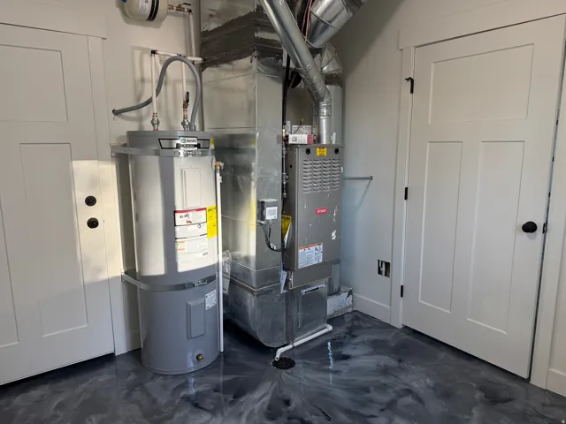 Water heater and furnace, complemented by a patterned epoxy floor finish