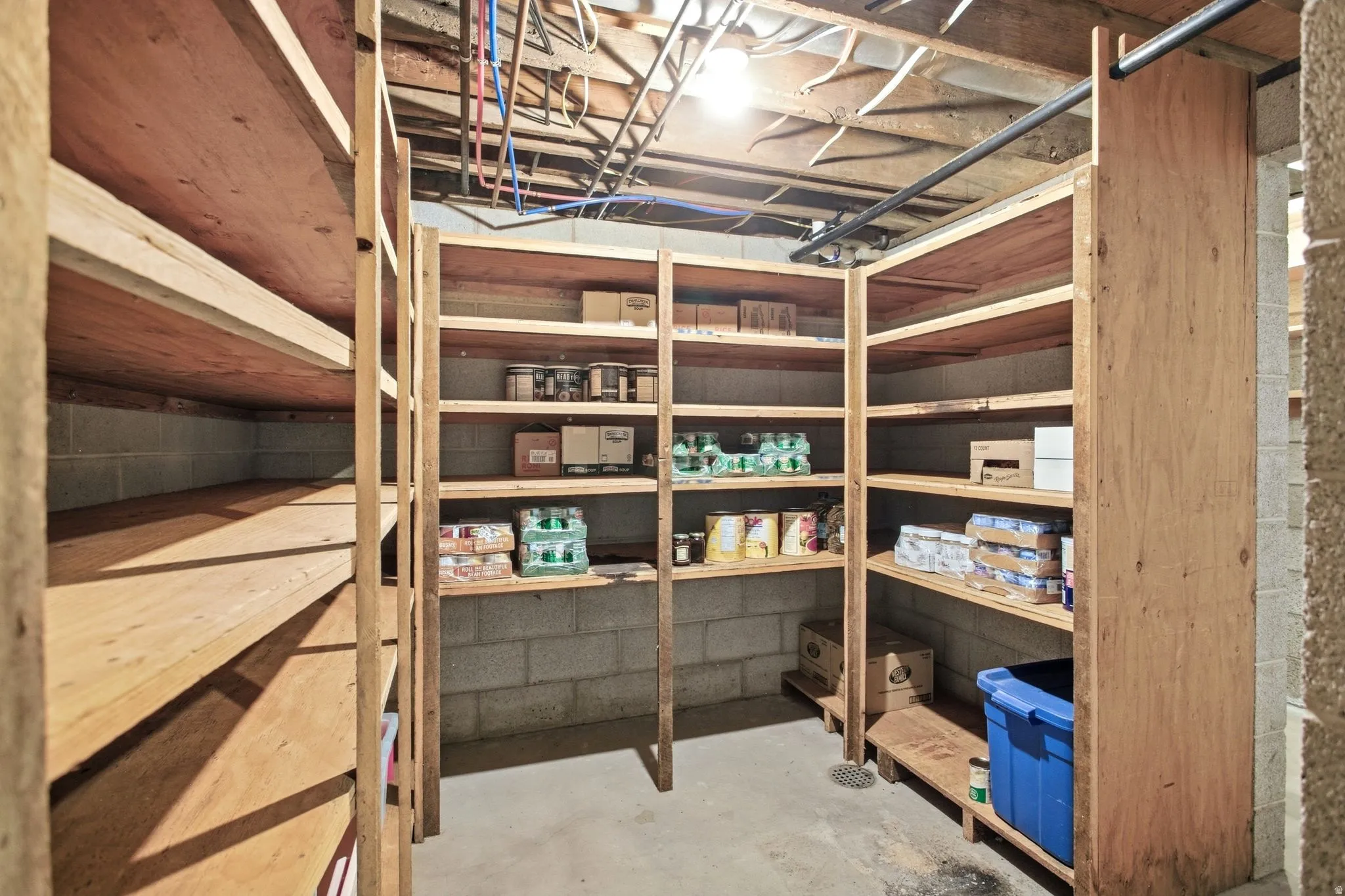 Extensive built-in wood shelving for ample storage