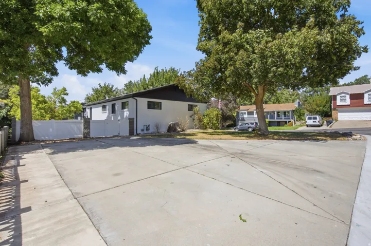 Expansive concrete driveway for RV parking or additional guest parking