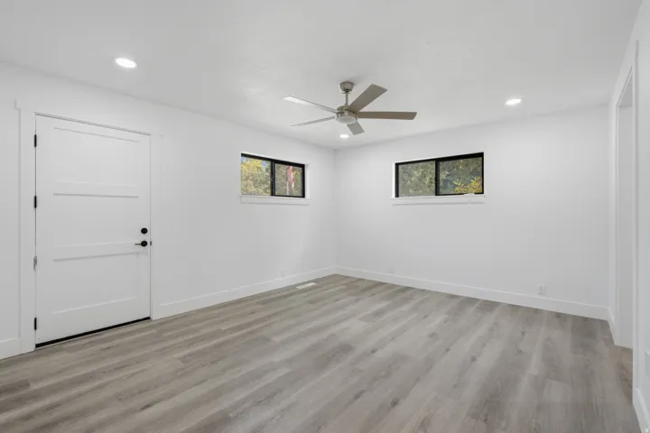 Recessed lighting and a ceiling fan with dimmer switch