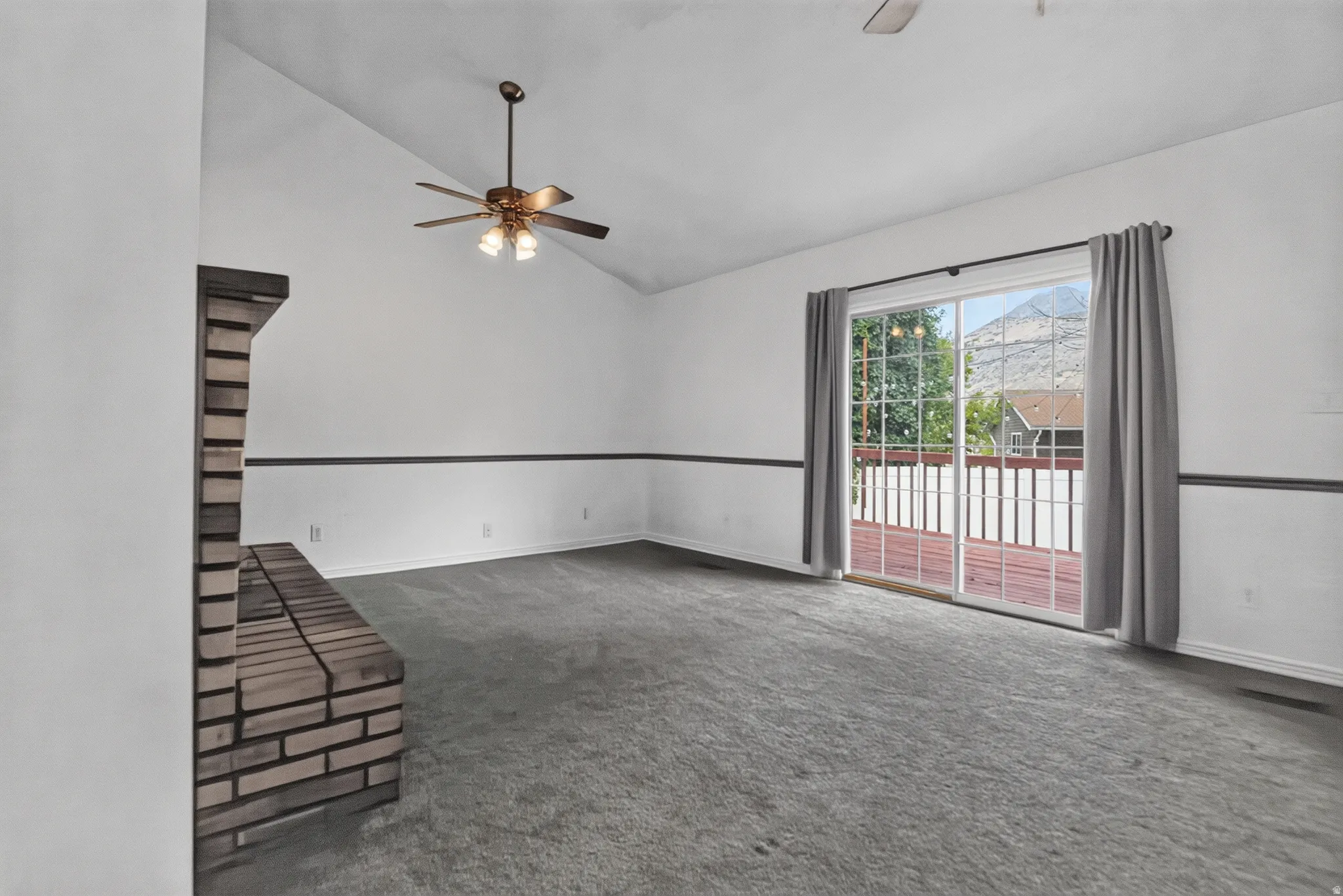 Vaulted ceilings! Doors leading to deck!