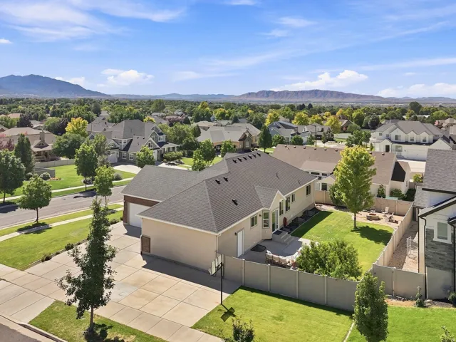 Expansive paved driveway and attached garage
