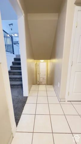 Tile flooring to basement.