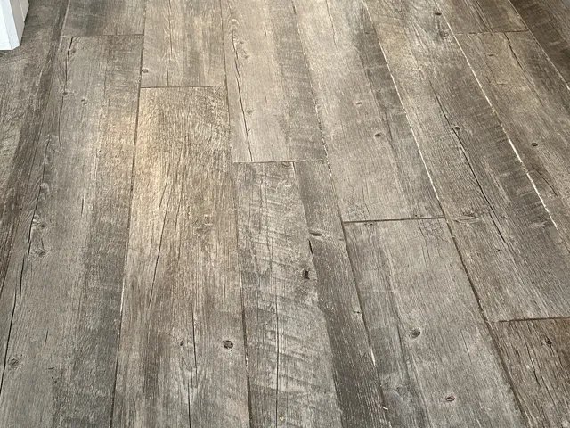 Distressed wood-finish tile flooring