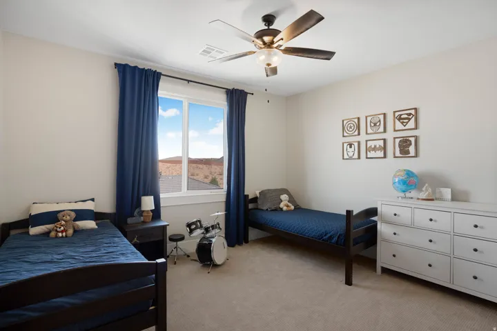 Neutral-toned walls complement the light-colored carpeting