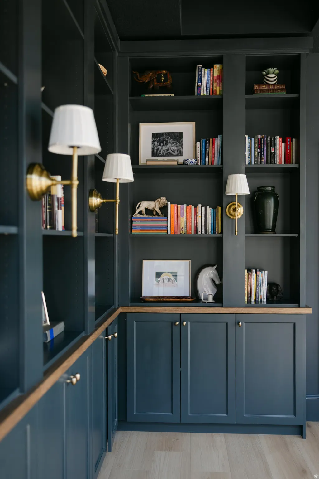 Custom built-in cabinetry with open shelving and lower storage