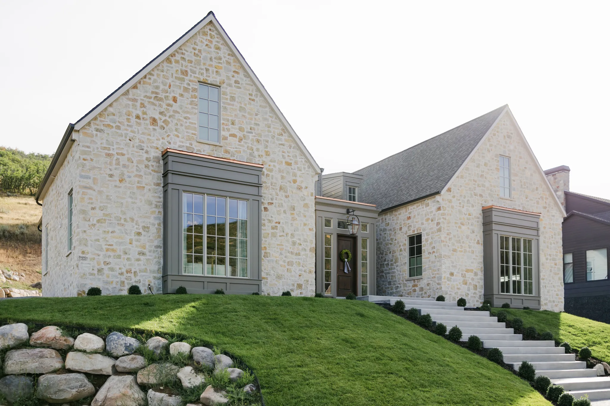 Stone exterior with gabled roof lines