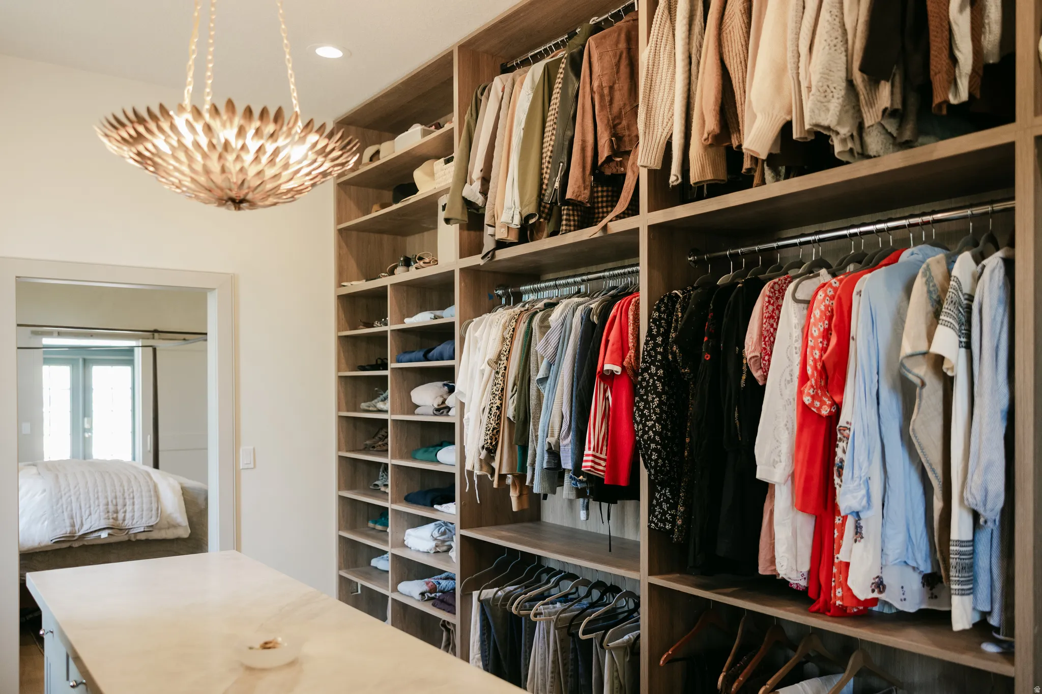 Built-in custom closet system featuring integrated shelving and hanging rods