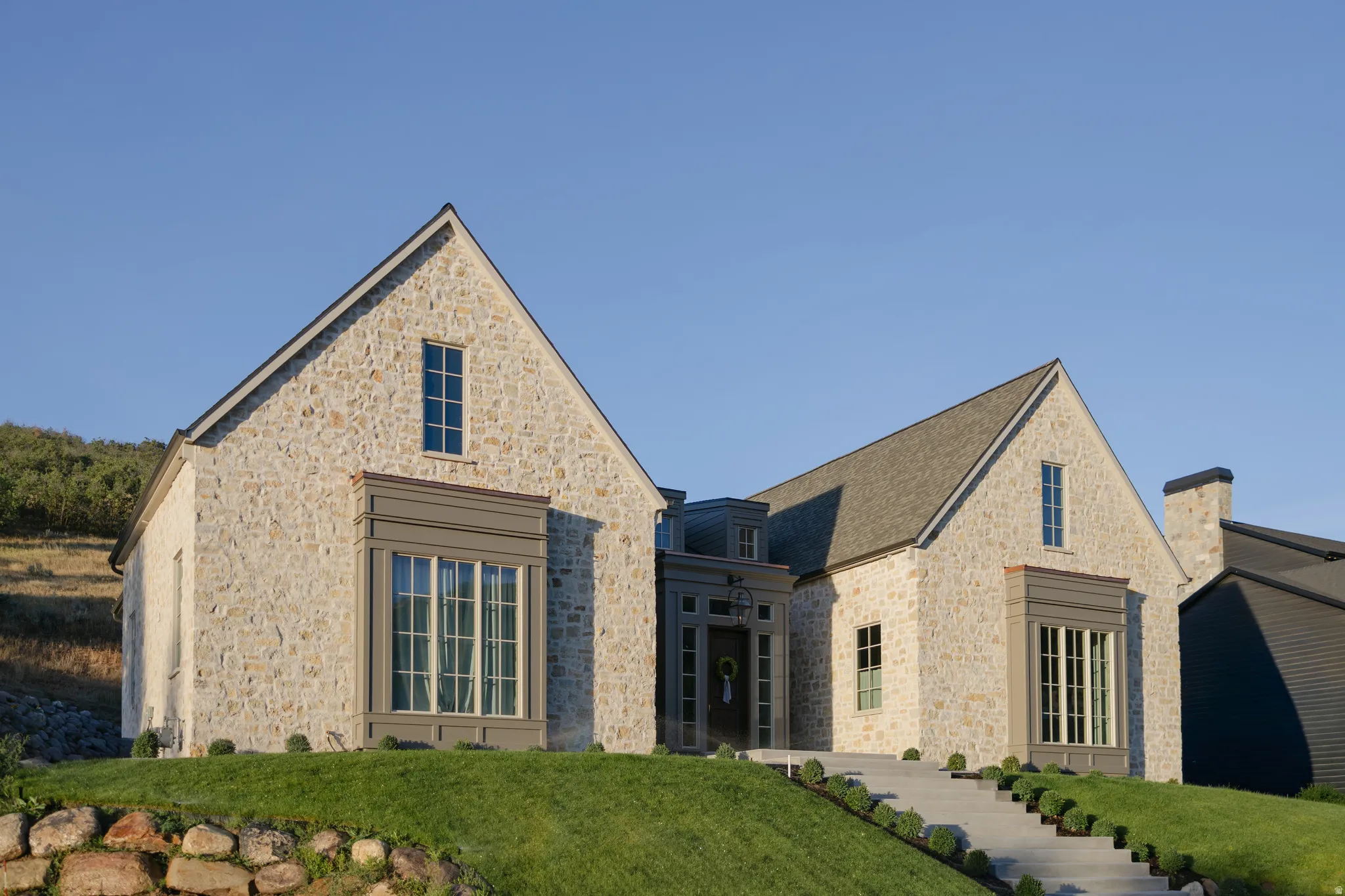 Stone exterior with gabled rooflines
