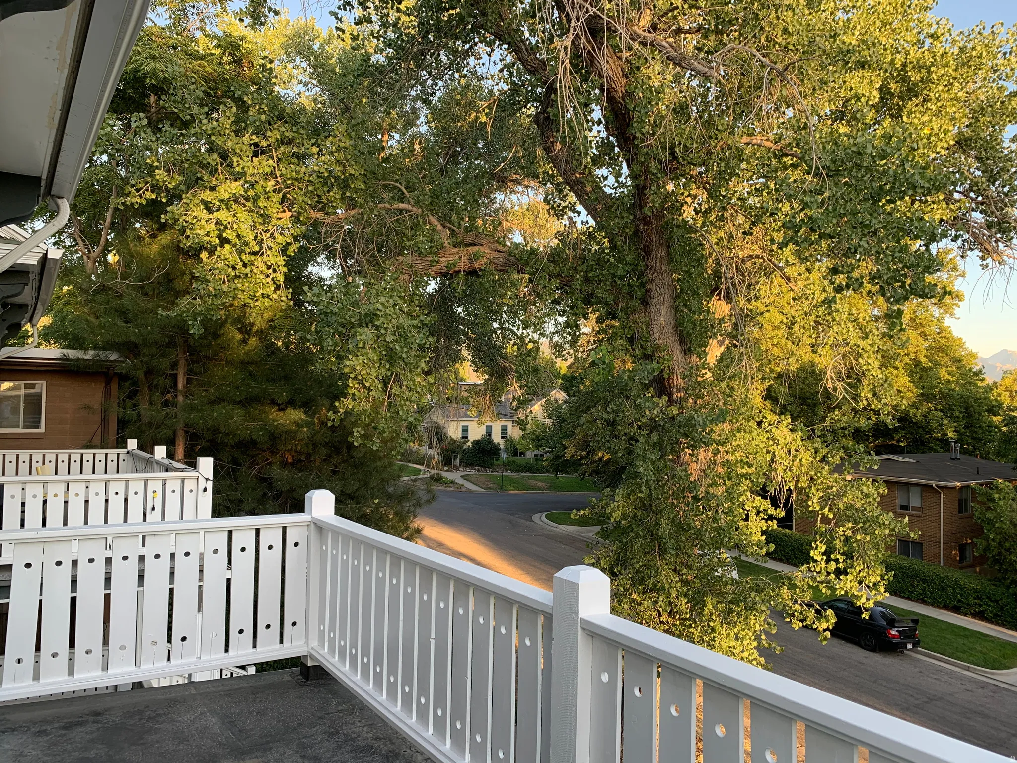 Private balcony with white railing