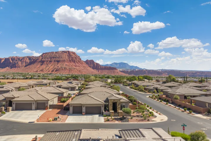 Residential neighborhood featuring paved streets and desert landscaping
