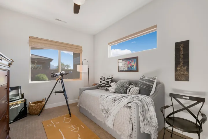 White walls with a single ceiling fan