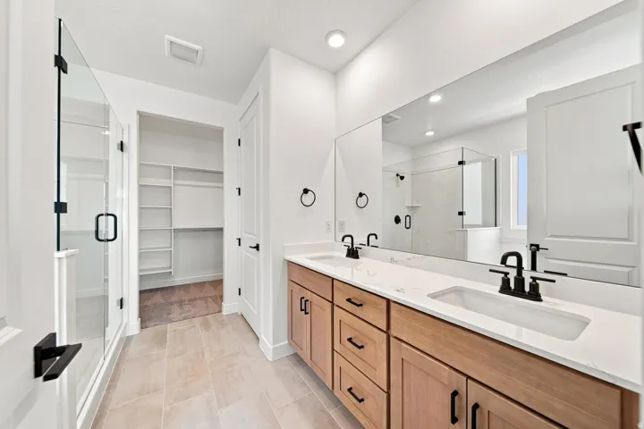 Dual vanity with stone countertop and integrated sinks