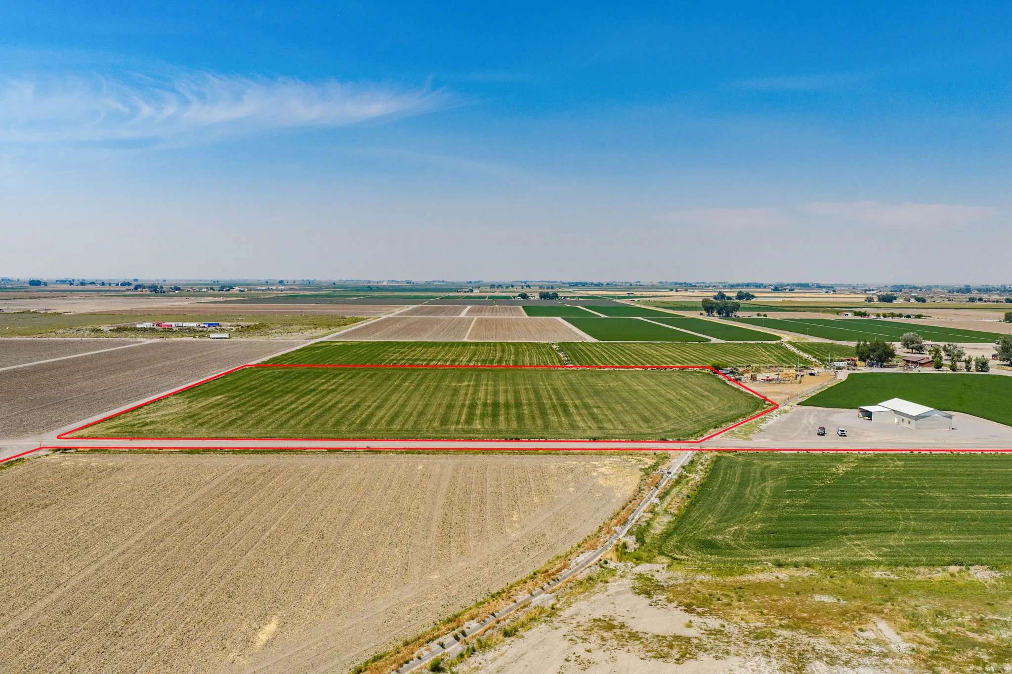 Expansive agricultural land featuring cultivated fields