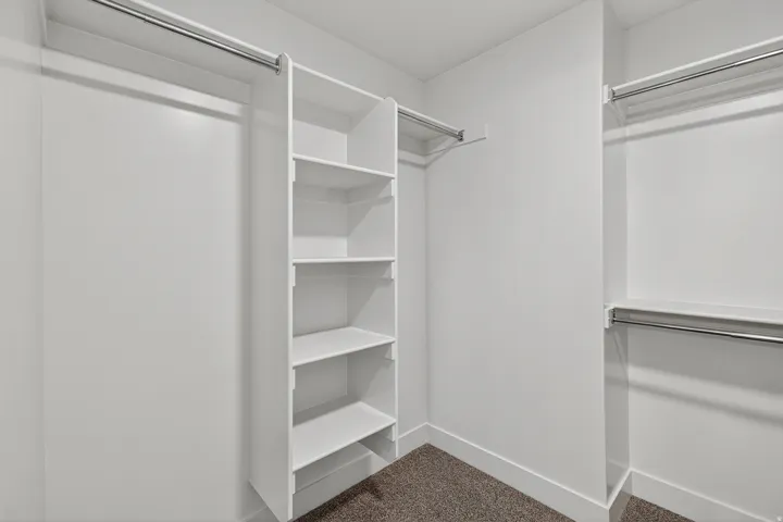 Integrated shelving unit with multiple storage shelves and hanging rods