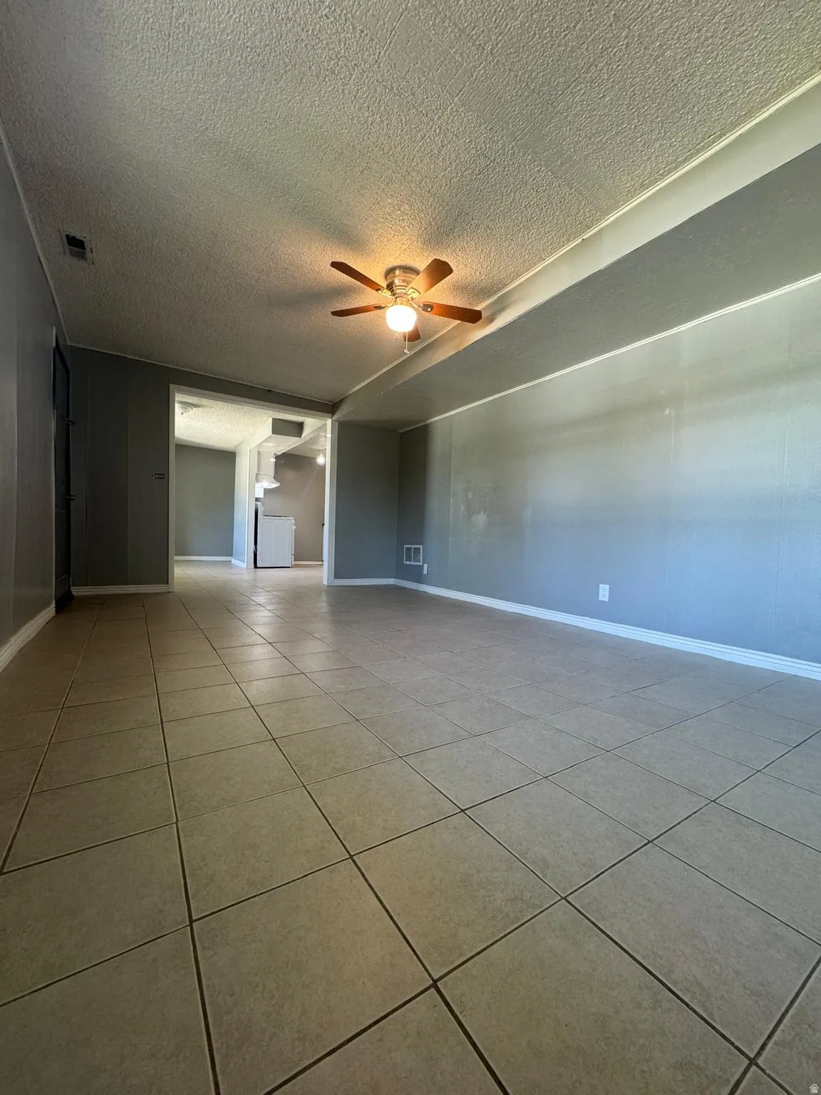 Tile flooring, ceiling fan with integrated lighting
