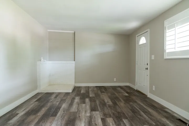 Living room looking toward the front door.