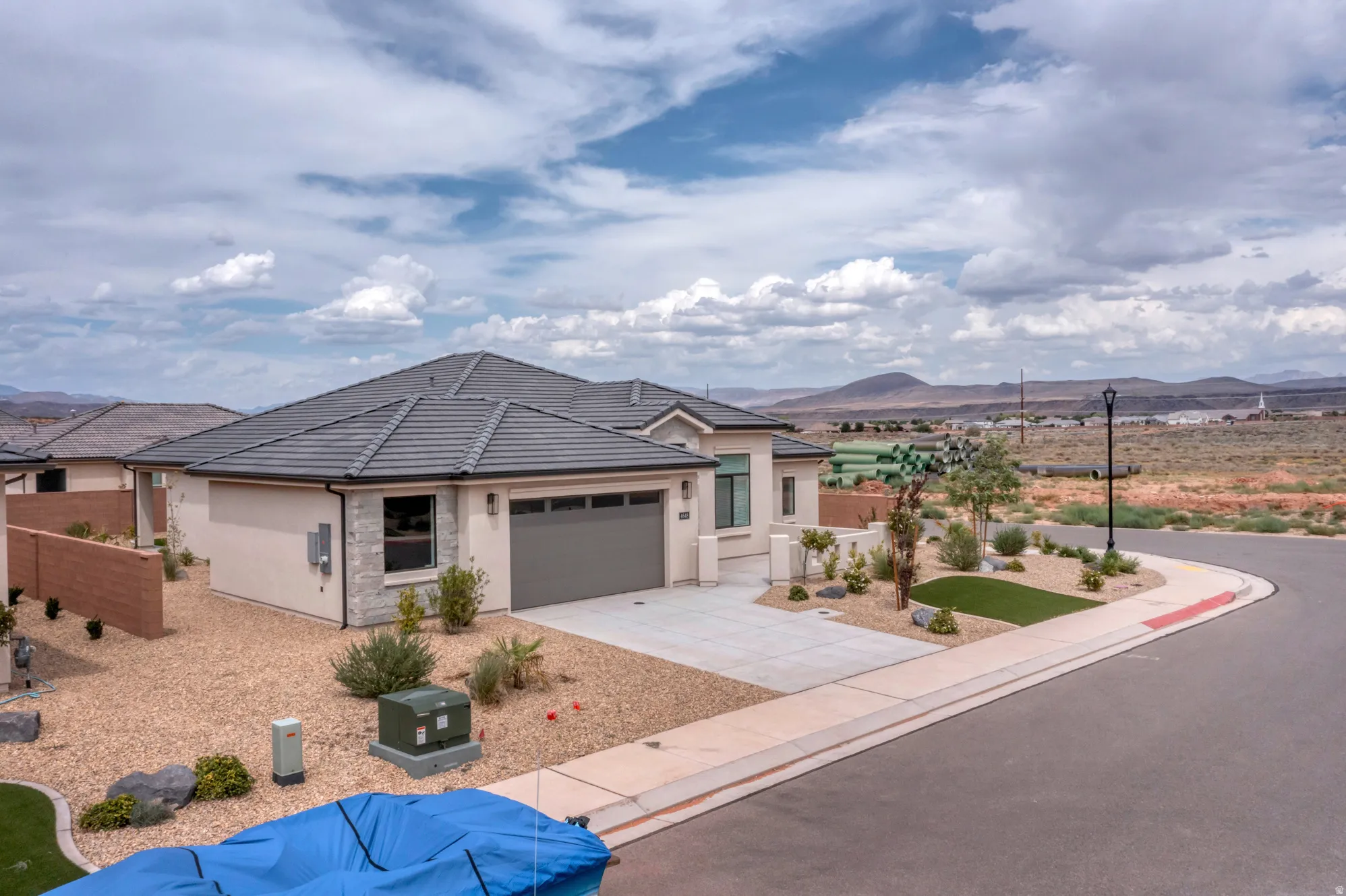 Contemporary single-story residence with a gray tile roof