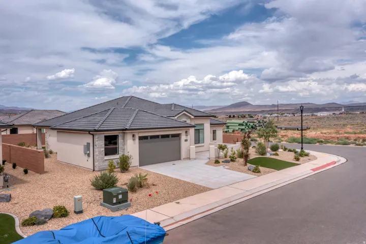 Contemporary single-story residence with a gray tile roof