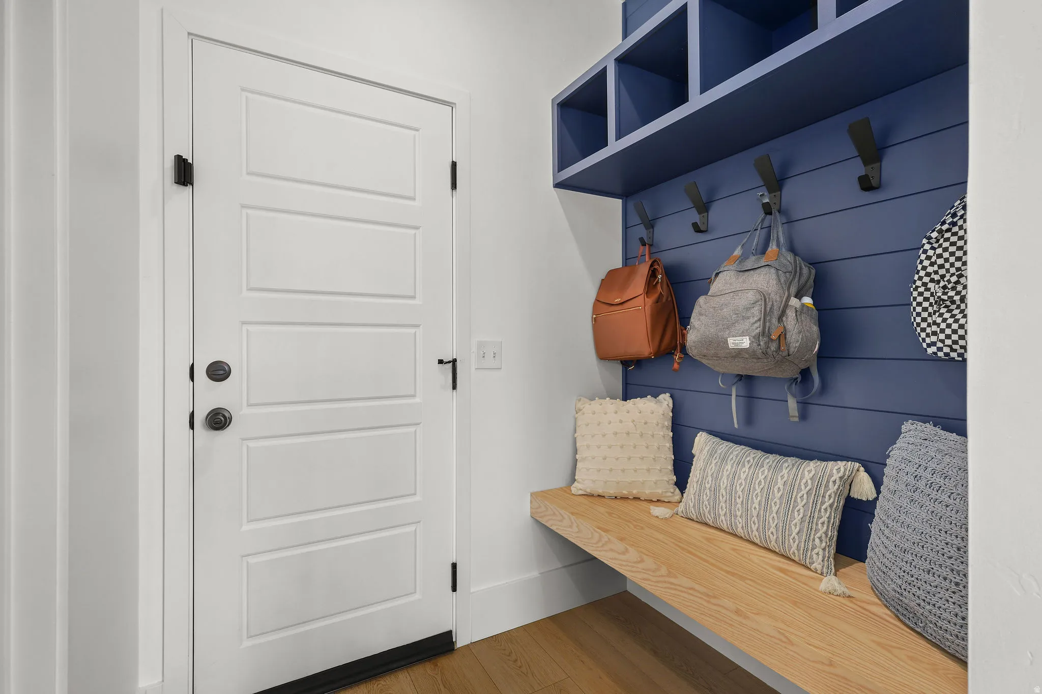 Built-in storage bench with wood-finish top