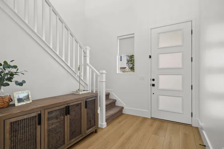 Wood-finish flooring throughout the entryway