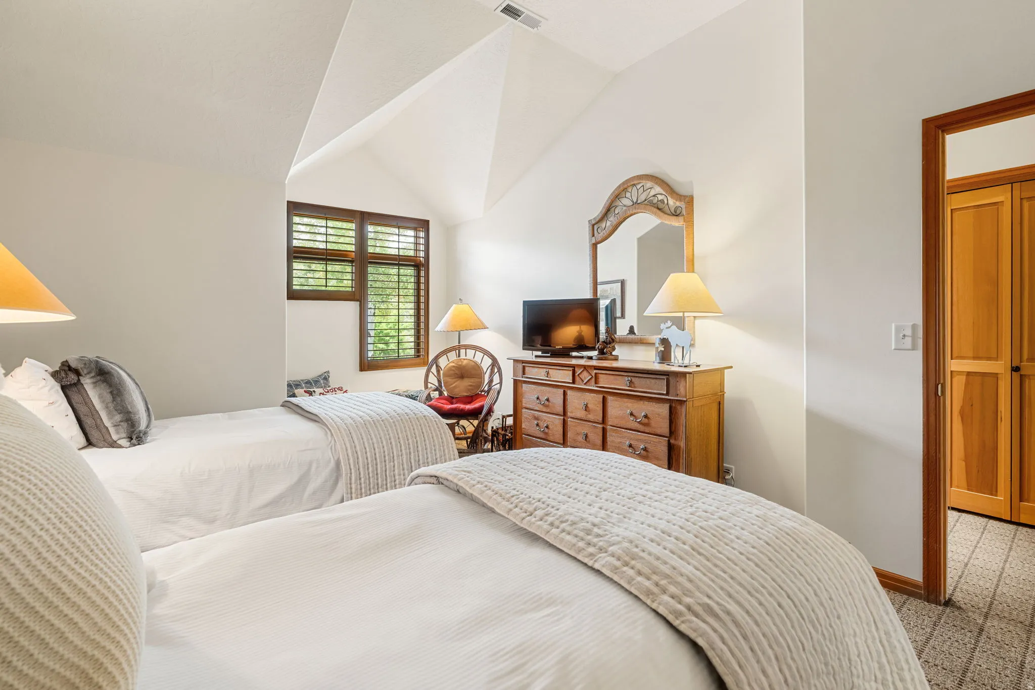 Vaulted ceilings with crisp white walls